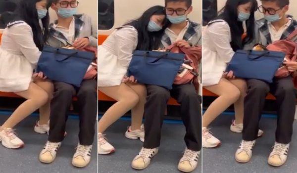 @20206989410 用户上传：女友在地铁上帮男友打飞机